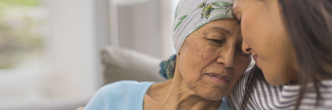 A woman battling cancer finds comfort in her daughter's company