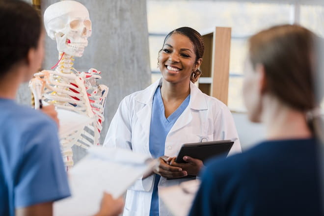 Smiling medical students in class