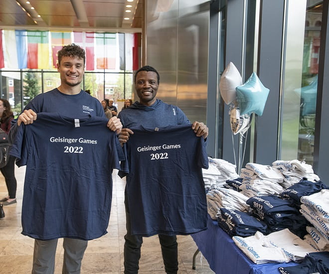 Two Geisinger students with Geisinger Games shirts