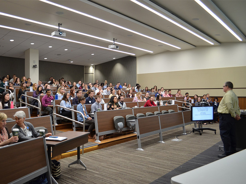 A professor teaching his class