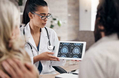 A medical professional displaying an image
