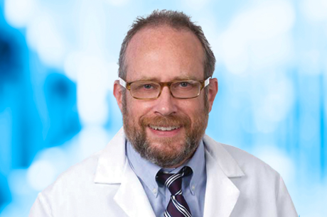 Neil Holland, MBBS, BSc, MBA