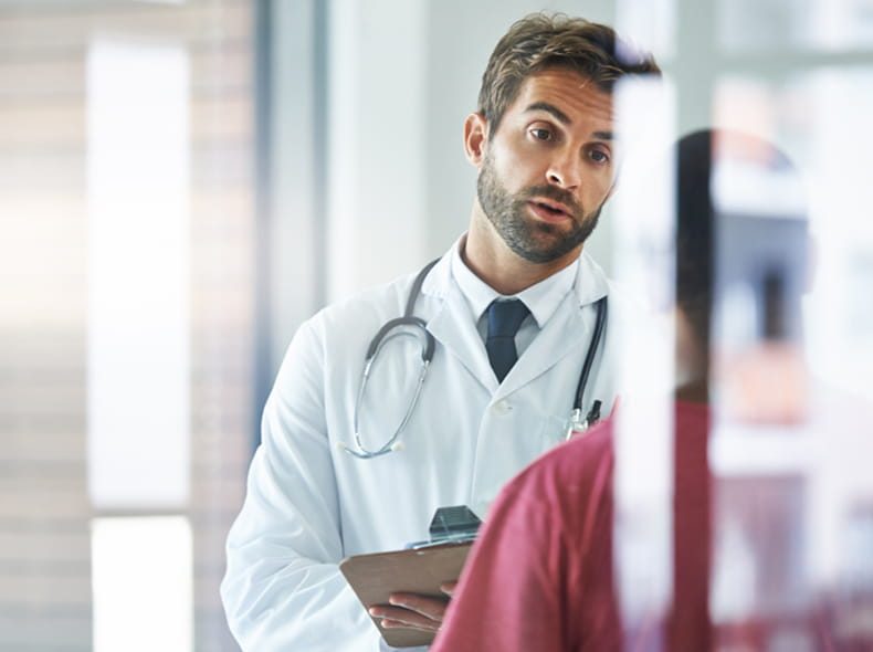 A doctor talking to a patient