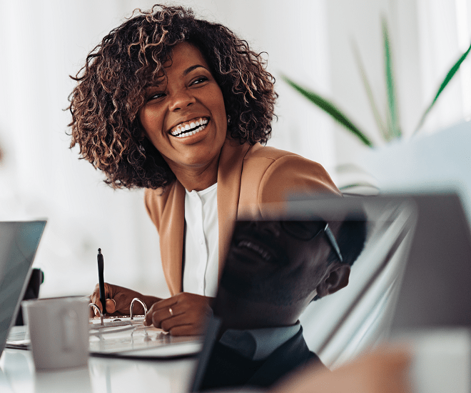 Woman smiling in an office