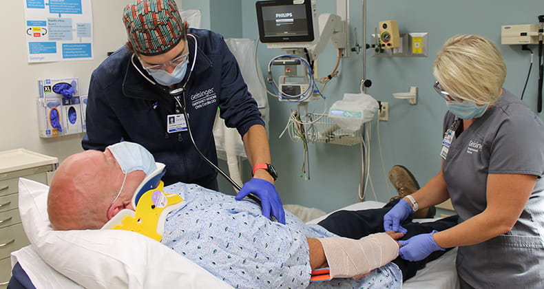 A patient getting assessed by doctors