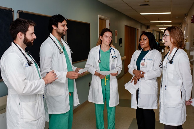 Five Geisinger providers having a conversation