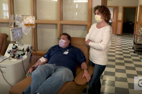 Patrick Konitzer M.D., a COVID-19 plasma donor, undergoes the donation process at Geisinger Medical Center in Danville, as registered nurse Stephanie Wise watches nearby.