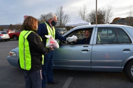Man receives drive thru meal 