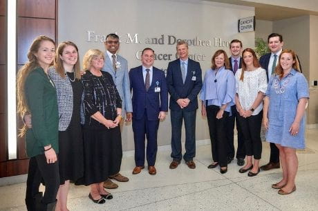 Henry family members are Geisinger cancer institute leadership at ribbon cutting.