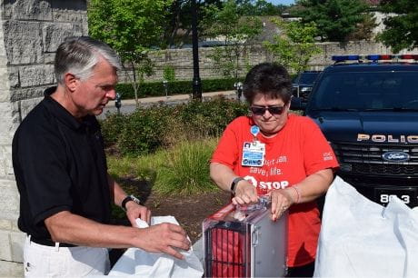 Geisinger Community Medical Center presents stop the bleed kits to University of Scranton police.