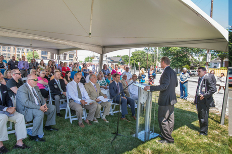 Crowd listening to the speaker at the GSWB ribbon cutting event.