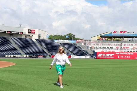 woman on baseball field