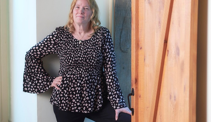 Cynthia Wysocki stands in the doorway of her Danville home, after adopting a healthy lifestyle with the help of Geisinger’s Preventing Diabetes program.