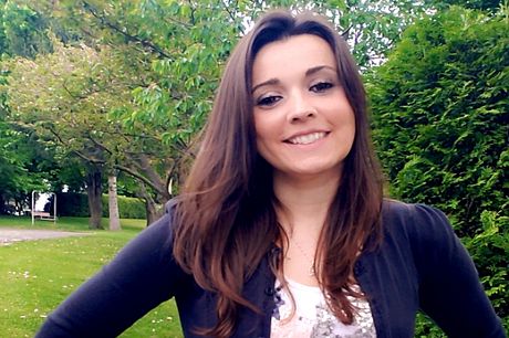 Kara Bigger standing outside and smiling.