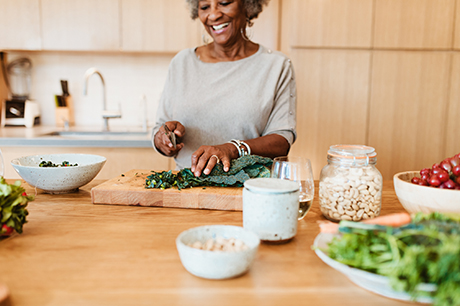 Woman cooking in her kitchen