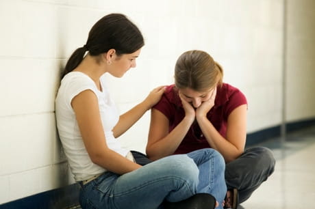Mother talking to her daughter
