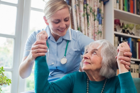 Nurse assisting a stroke patient