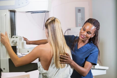 Woman receiving a mammogram