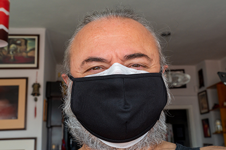 A main wearing a double mask