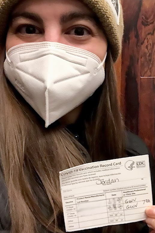 Jordan receives her first COVID vaccination shot.