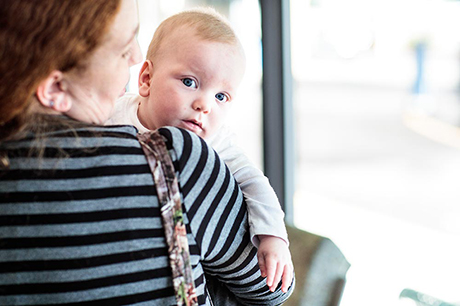 an image of a mother holding a baby