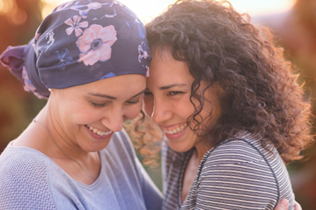 One woman with cancer embracing