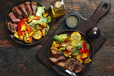 Steak and potatoes come together to make a unique and hearty salad.