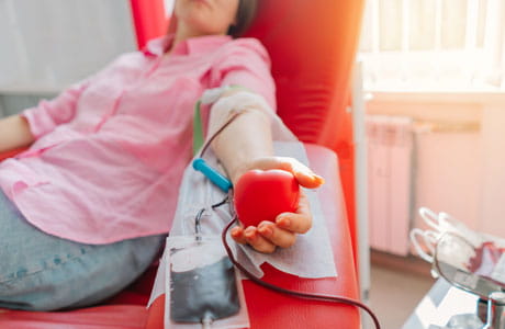 Sitting down getting blood drawn