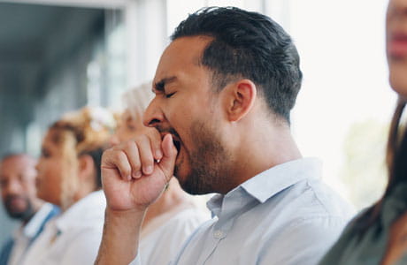 A man yawning due to low testosterone
