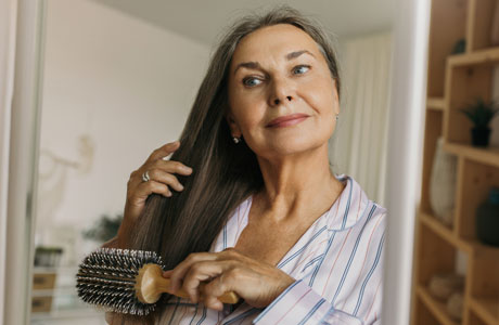 Woman brushing her hair