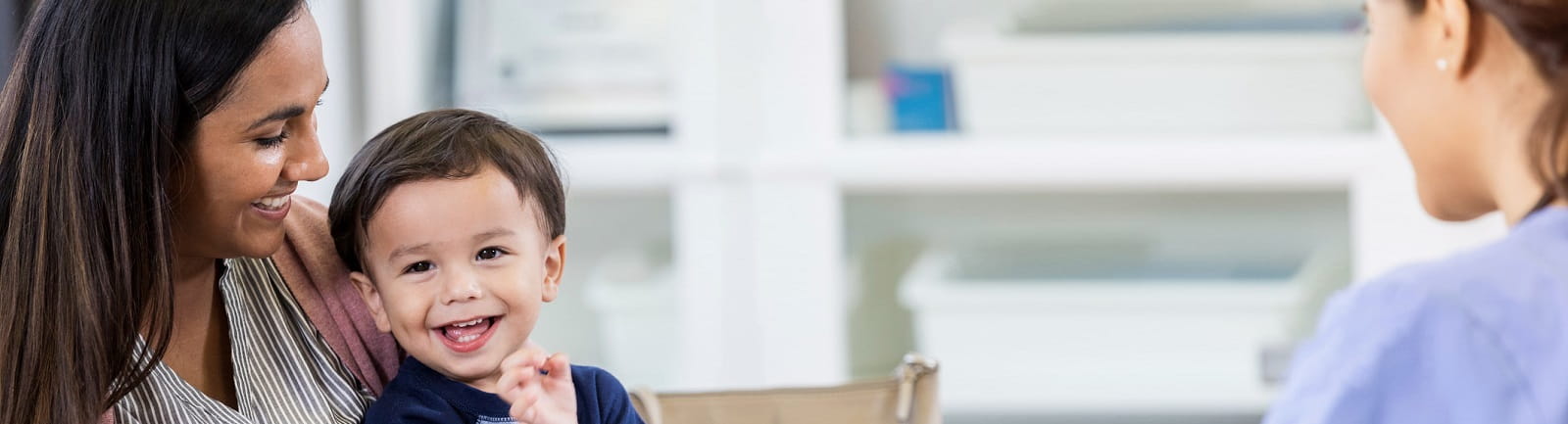 A mom and son visiting the pediatric neurologist
