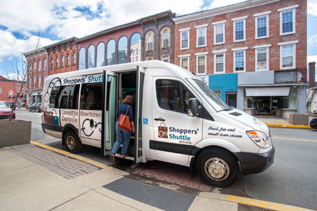 resized-Woman getting on shuttle (1)